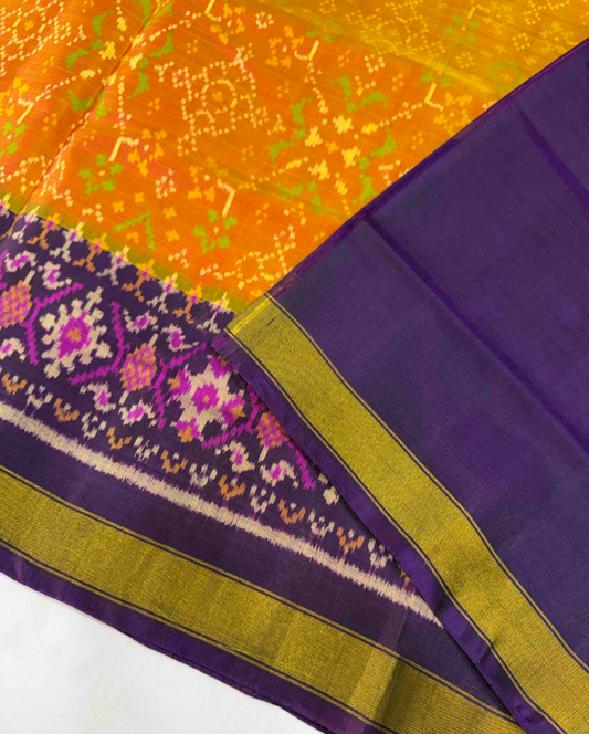 Vibrant Orange & Purple Singal ikat Patola-Inspired Silk Saree with Designer Pallu