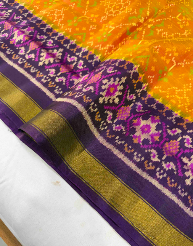 Vibrant Orange & Purple Singal ikat Patola-Inspired Silk Saree with Designer Pallu