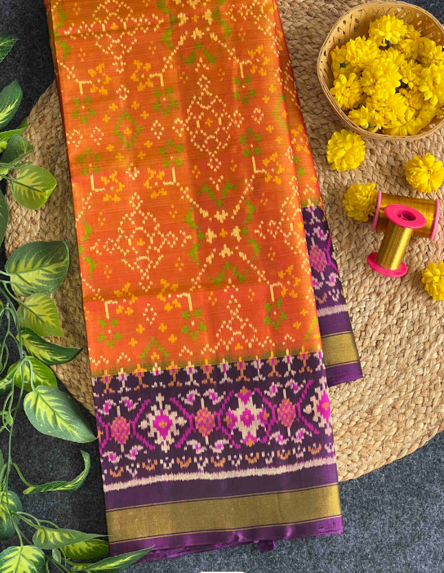 Vibrant Orange & Purple Singal ikat Patola-Inspired Silk Saree with Designer Pallu